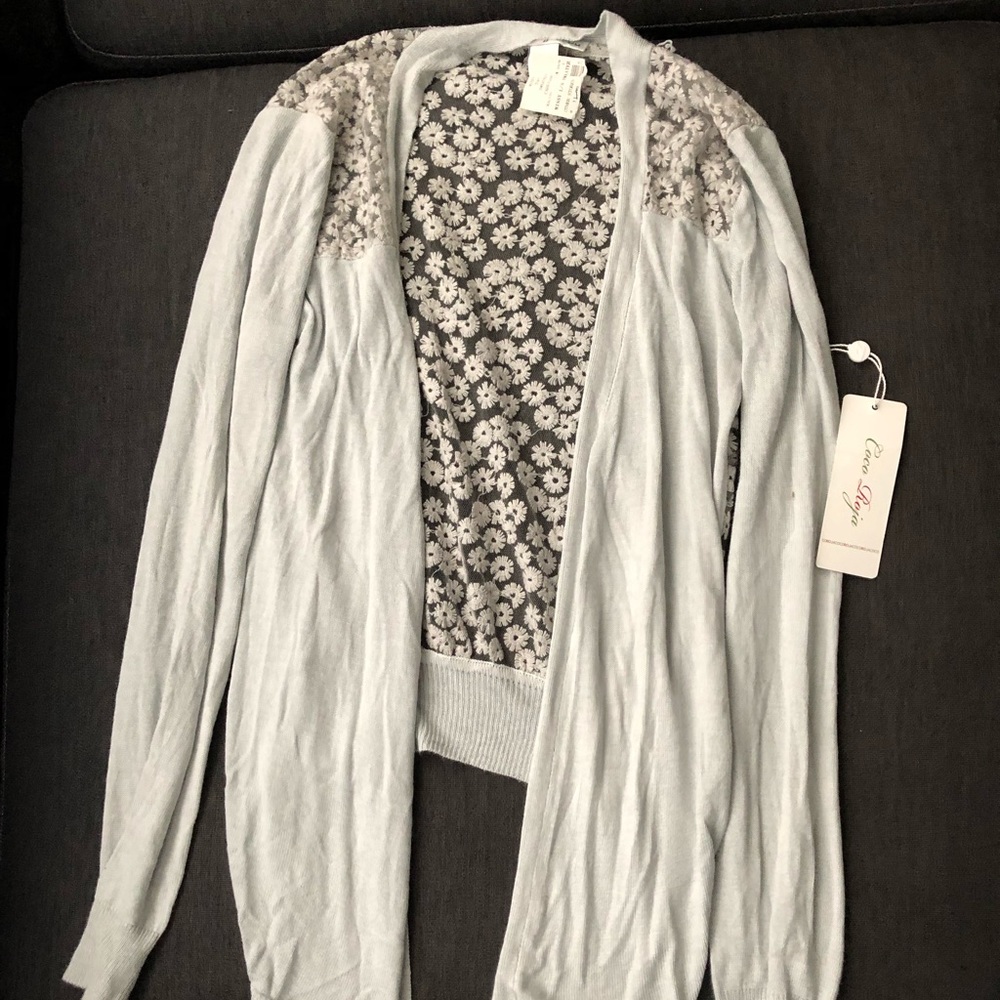 Grey with flowers in the back cardigan